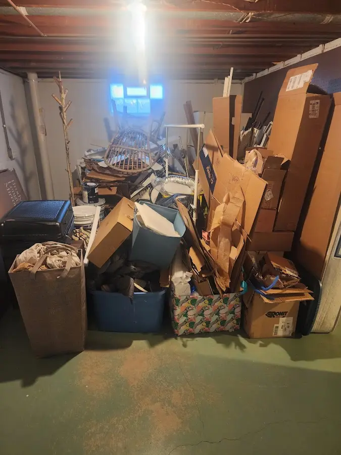 Roll-off dumpster container at job site for Yard Waste Dumpster Rental in North Kensington